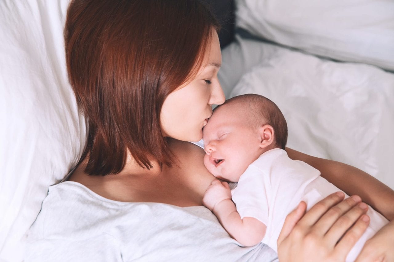 newborn baby with mother