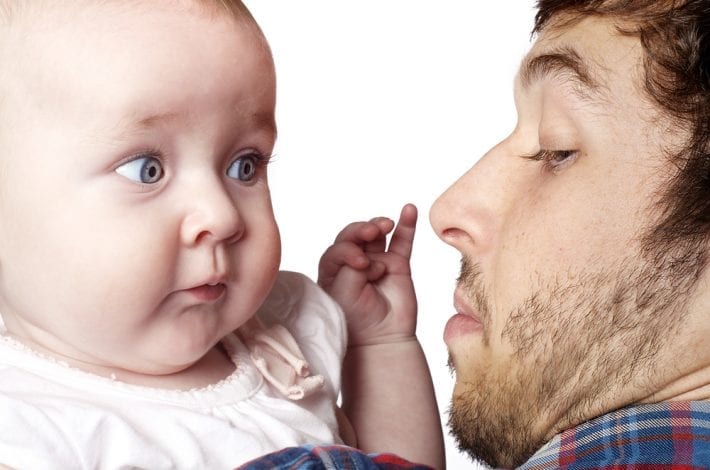 Dad and baby - Dad and baby making funny faces at each other