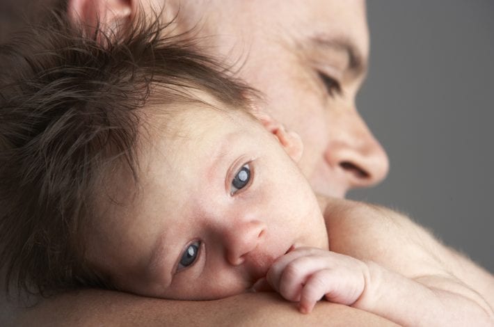 Dad and baby - Dad and newborn baby enjoying skin to skin dad and baby bonding time