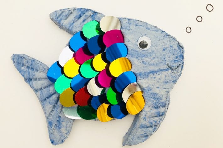 Rainbow fish craft - try this fun kids craft using air drying clay and colourful sequins. A quick and easy make for kids to enjoy