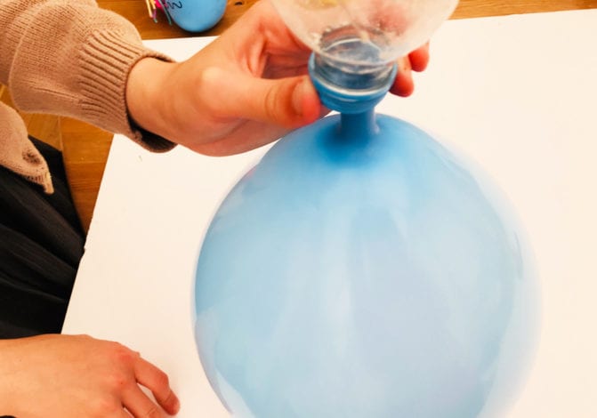 Fun kids crafts - balloon squishmonsters adding flour