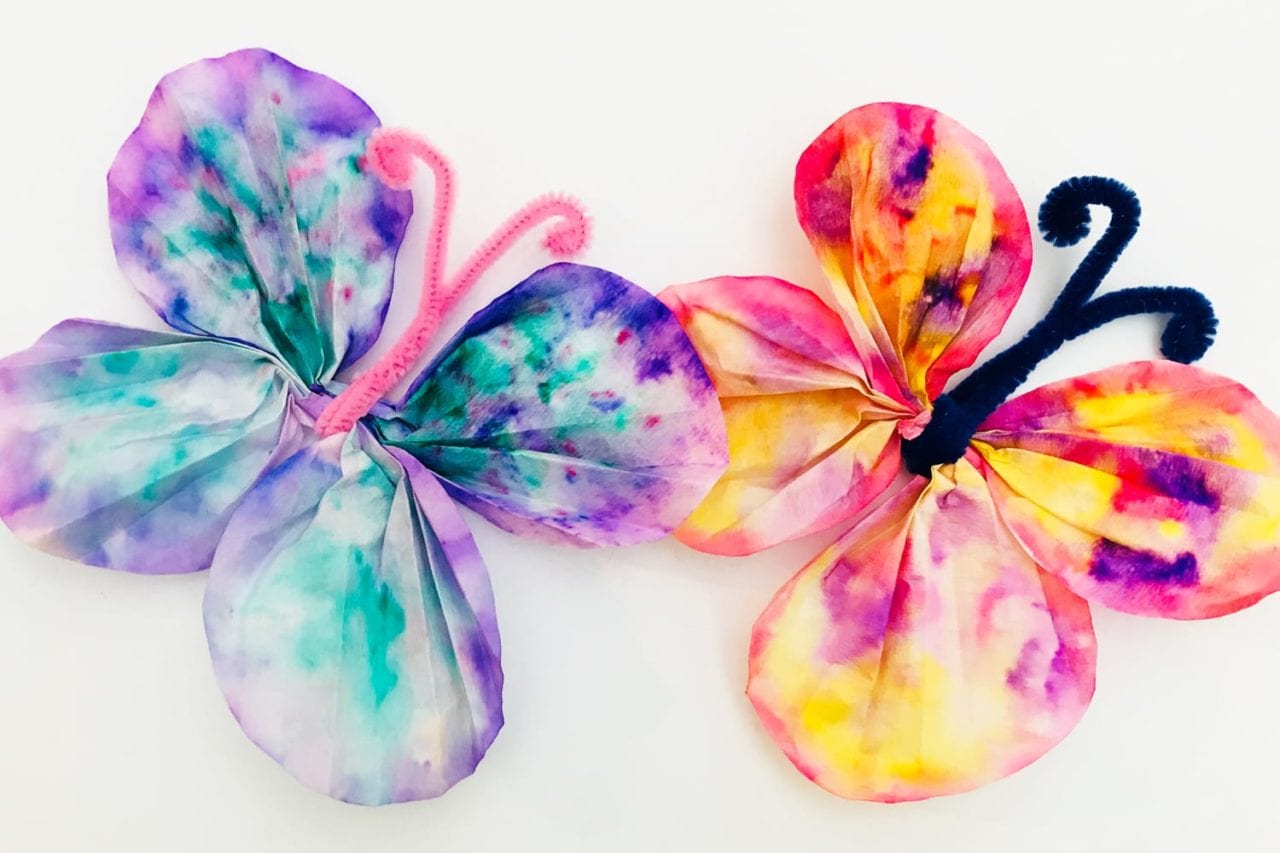 Fun kids crafts - make these beautiful coffee filter butterflies using just coffee filters and paints - a quick and easy spring butterfly craft to enjoy with the kids