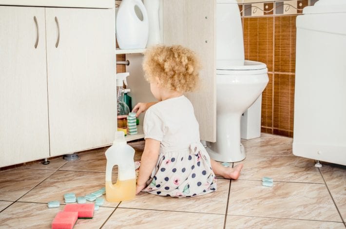 cleaning detergents toddler playing dangerous babyproofing