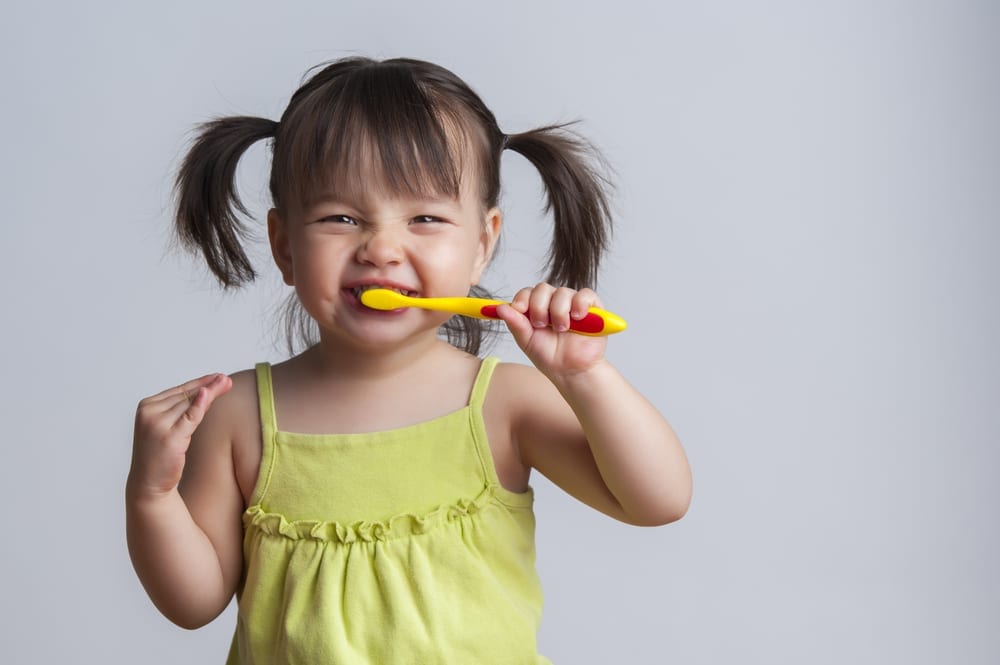 Kids not brushing teeth? 11 fun ways to win the toothbrushing battle image