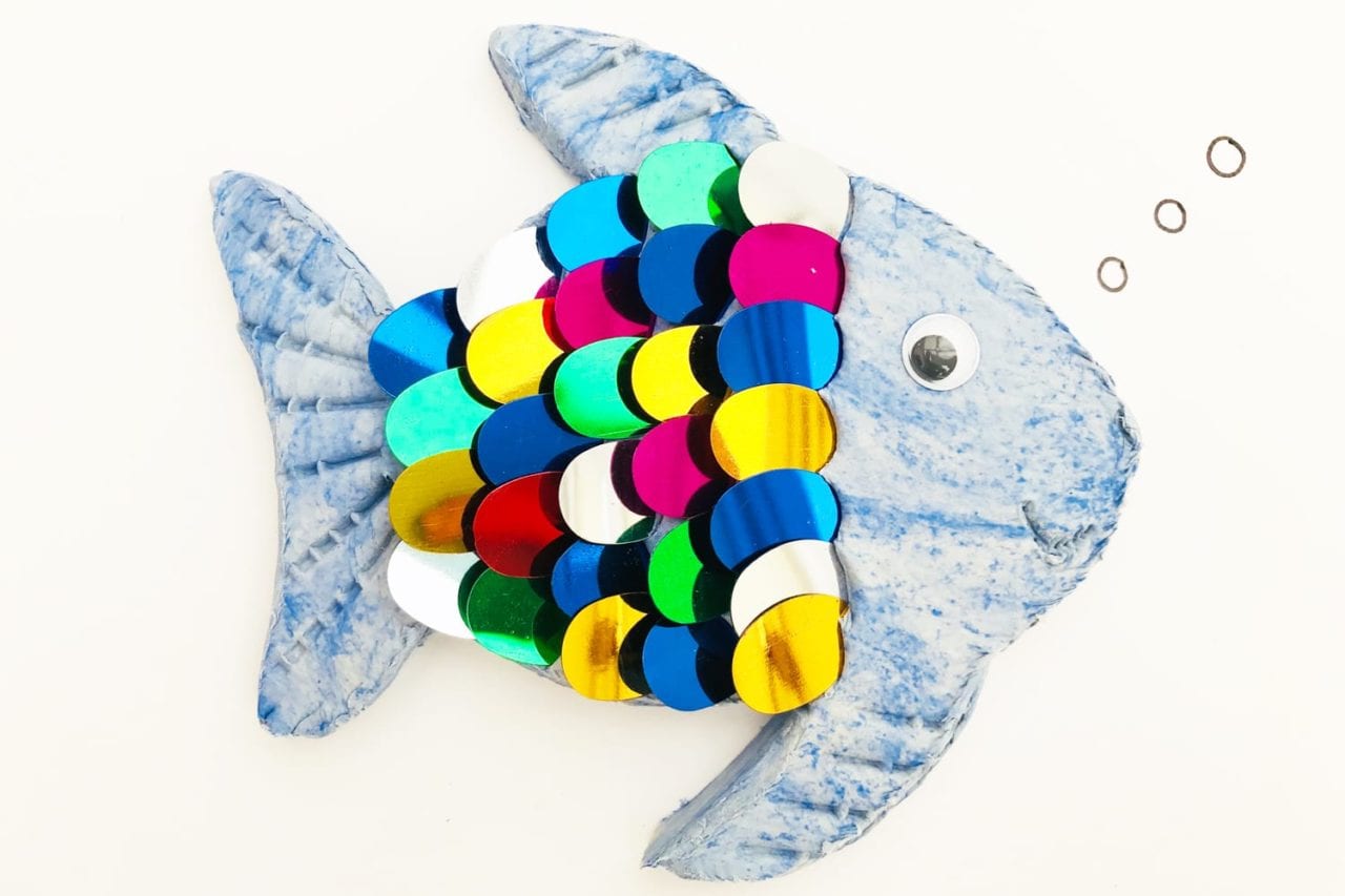 Rainbow fish craft - try this fun kids craft using air drying clay and colourful sequins. A quick and easy make for kids to enjoy