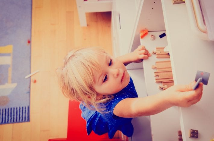 unsecure furniture, toddler climbing to reach something high, danger in the home