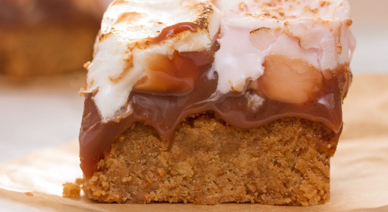 Baked smores bars with an oat base - make these gooey dessert bars for a bonfire night treat