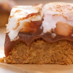 Baked smores bars with an oat base - make these gooey dessert bars for a bonfire night treat