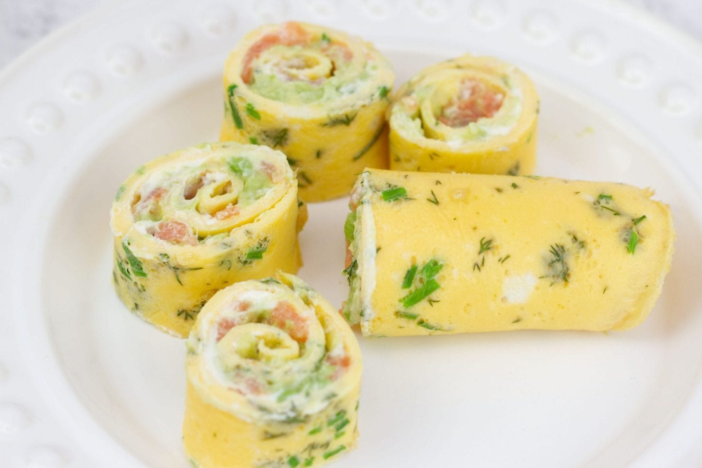 Egg roll up with salmon and avocado image