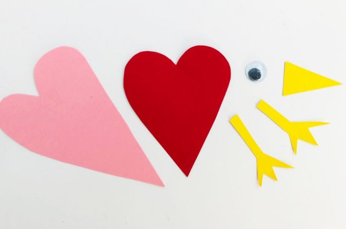 Adorable Valentines craft for kids with these little love bird paper plates