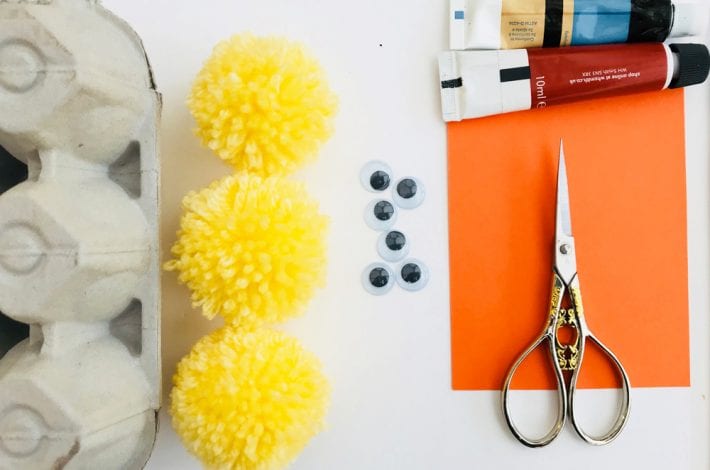 Egg carton craft - enjoy making these cute hatching pom pom chicks as an Easter craft with the kids