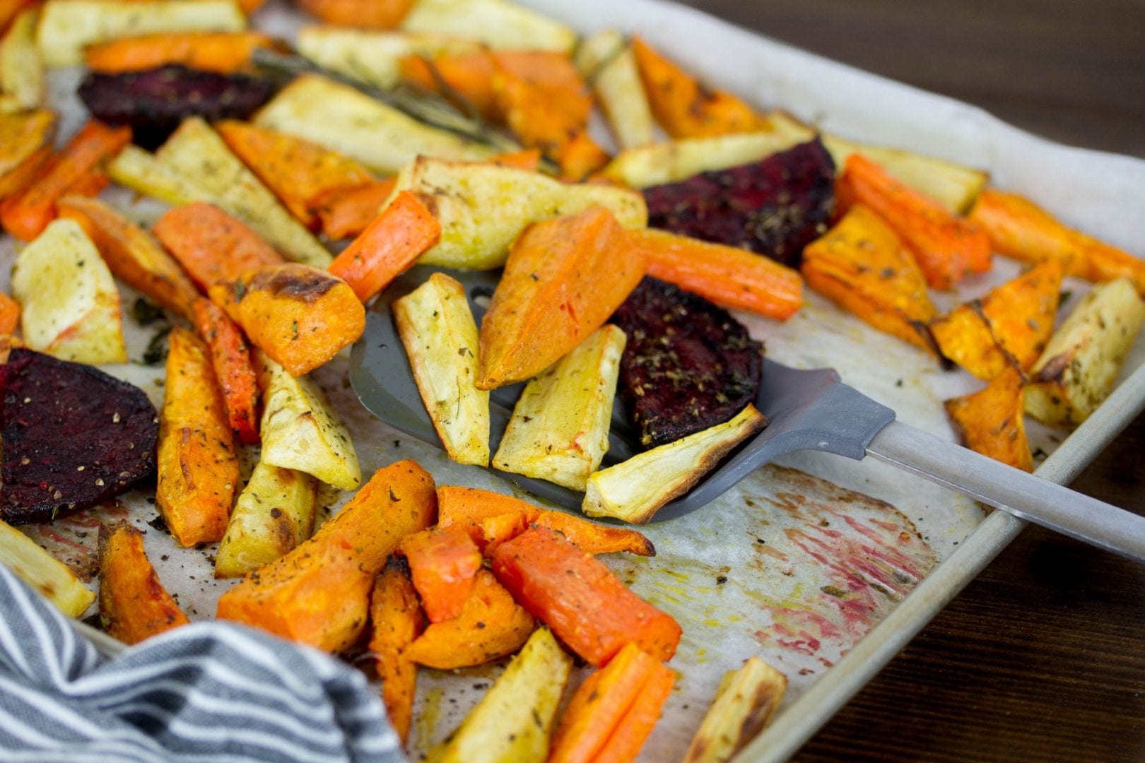 Roast beetroot and root vegetables with fresh herbs - perfect for Sunday family lunch