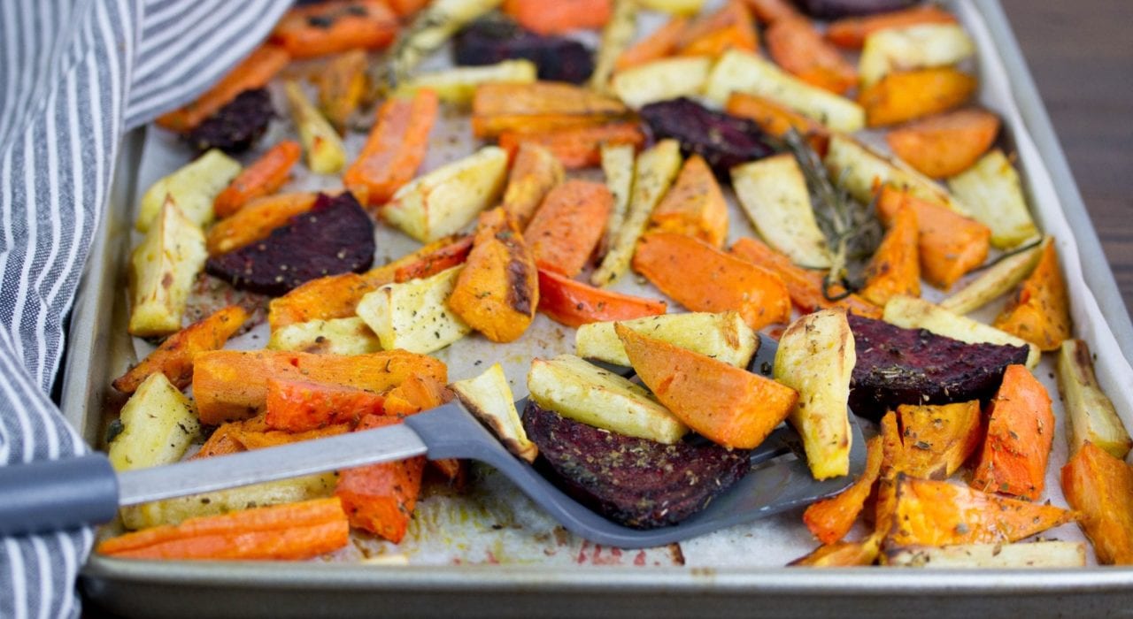 Roast beetroot and root vegetables with fresh herbs - perfect for Sunday family lunch