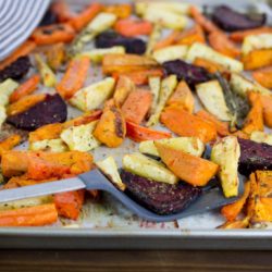 Roast beetroot and root vegetables with fresh herbs - perfect for Sunday family lunch