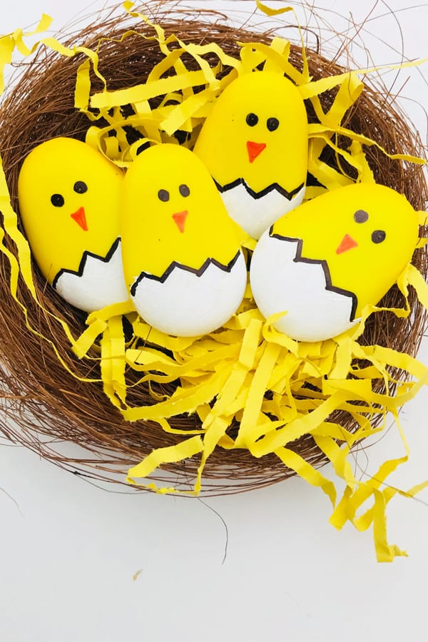 Easter rock painting - make these great easter chicks by painting pebbles - a great easter craft for kids