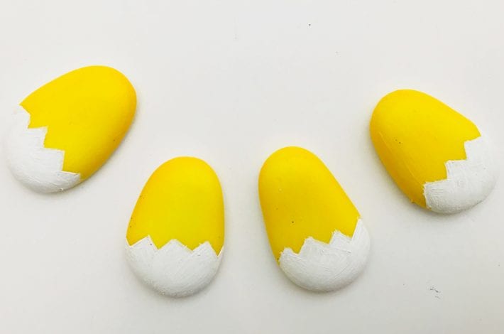 Easter rock painting - make these great easter chicks by painting pebbles - a great easter craft for kids