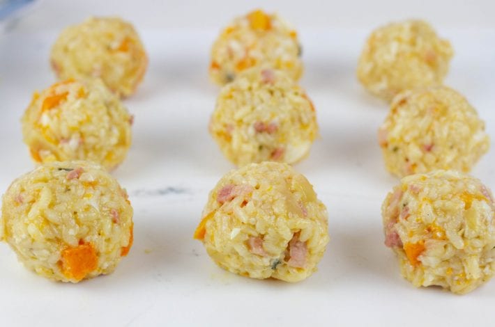 Make these delicious arancini rice balls made with squash and pancetta risotto. Perfect for kids dinners or to use up leftover risotto