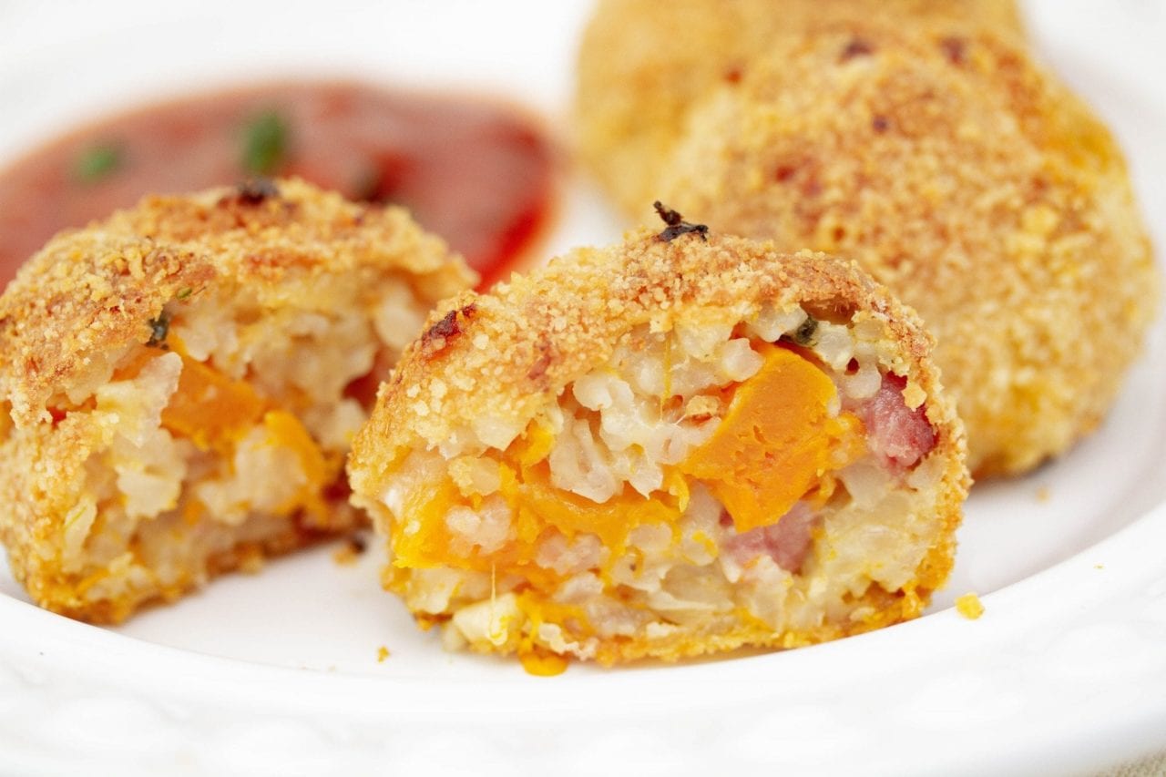 Make these delicious arancini rice balls made with squash and pancetta risotto. Perfect for kids dinners or to use up leftover risotto
