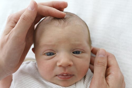 Signs of colic - how to soothe baby colic - symptoms of baby colic - baby colic relief