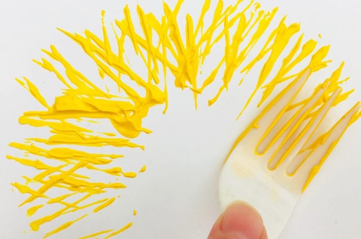 Fork painting - enjoy these funky fork print Easter chicks as a great Easter craft for kids