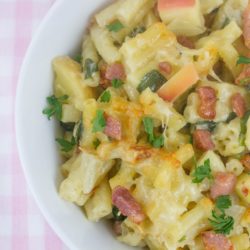 Bacon and apple mac and cheese at its best with slices of apple and a creamy sauce and hidden veggies