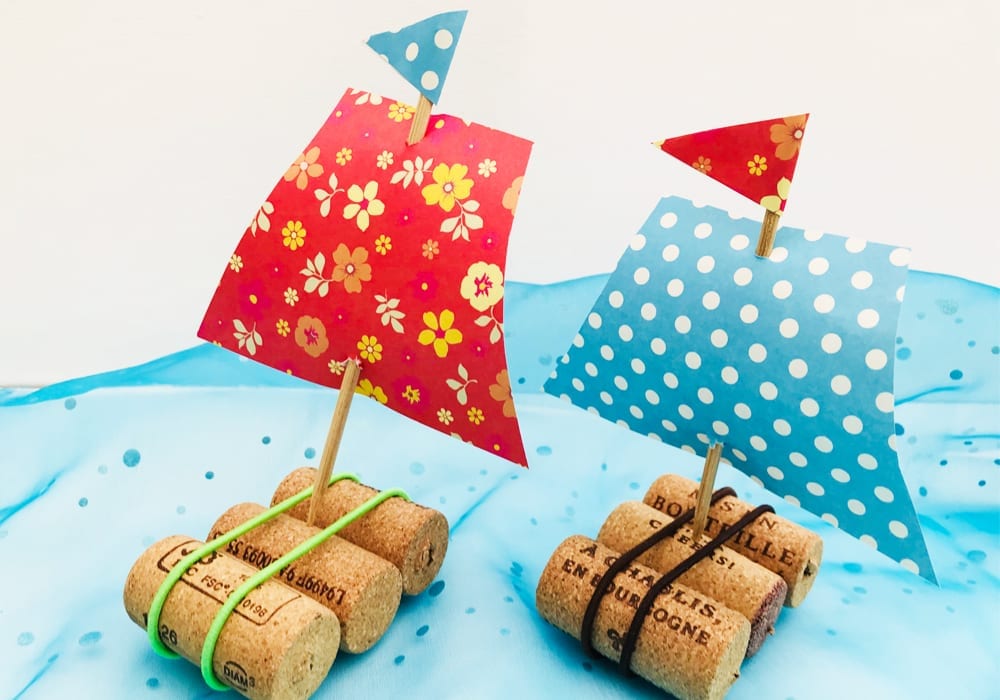 Recycled cork sail boats - make these floating cork boats this year as a great spring or summer craft for kids.