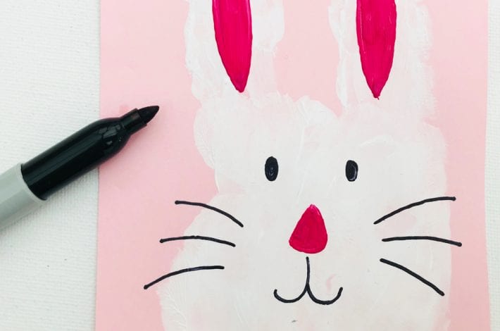 Easter handprint craft - make these cute little hand print Easter bunnies with this fun toddler craft