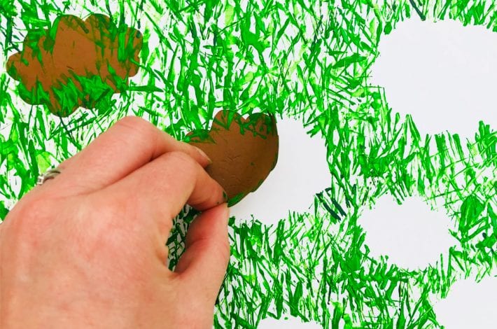 Dancing sheep craft for toddlers - give this spring craft for kids a go and paint these leaping lambs in a grassy meadow