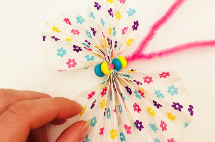 Cupcake liner butterflies that take just 5 minutes to make. A fun spring craft that kids can enjoy.