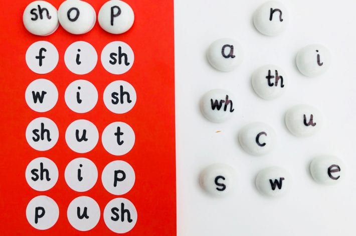 Alphabet stones - learn how to spell first words with this alphabet pebble spelling game. Ideal for early years learning and using letter phonics to sound out first words.