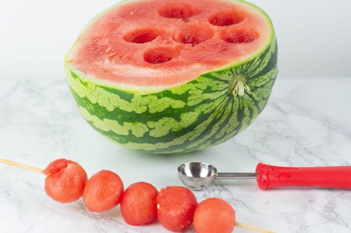 Frozen watermelon kebabs with a drizzle of honey and sprinkle of coconut. The perfect summer snack for kids