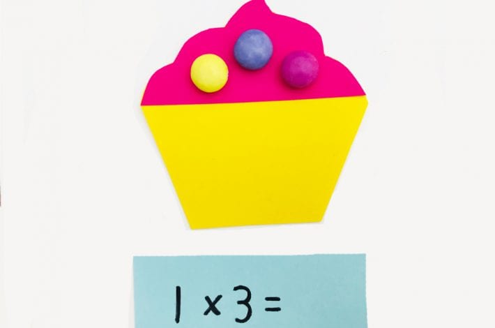 Have fun with times tables by playing this super fun (and yummy) cupcake game with your kids - a great game to teach those first times tables - learning fun for kids