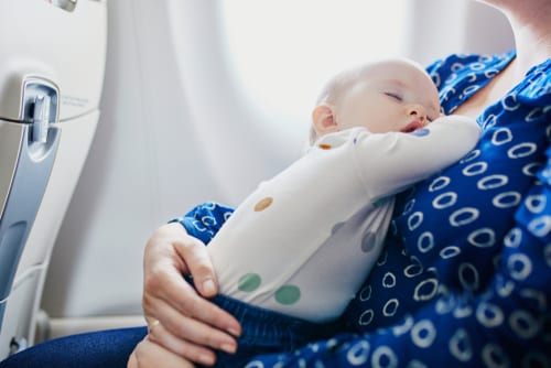 The essential guide to travelling with baby and toddler - how to manage plane flights and long trips with young kid