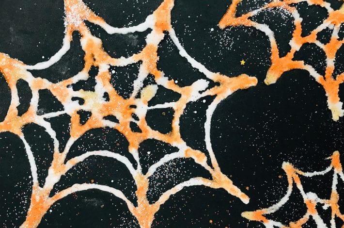 How to make salt painted spiders web - enjoy this great Halloween craft for kids and make these beautiful spider web salt paintings