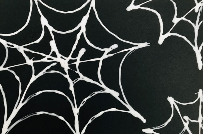 How to make salt painted spiders web - enjoy this great Halloween craft for kids and make these beautiful spider web salt paintings
