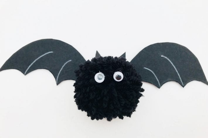 Make these awesome Halloween pom pom bats this October - a great craft for little kids that also make spooky homemade Halloween decorations