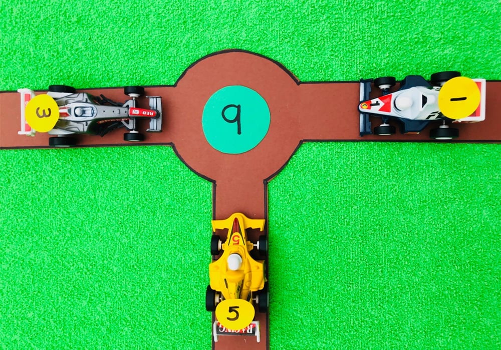 Adding 3 numbers - learn how to add 3 single digit numbers together in a fun way with this roundabout maths game