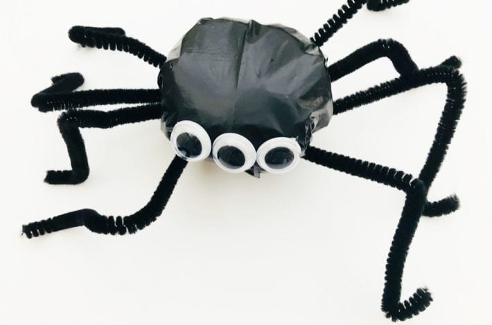 Make these spooky spiders out of the humble trash bag - a great Halloween spider craft for toddlers and kids to enjoy