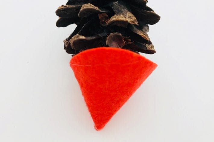 Make this pinecone fox as a great Autumn craft for kids. It's a quick and easy pine cone craft that kids will love this Autumn.