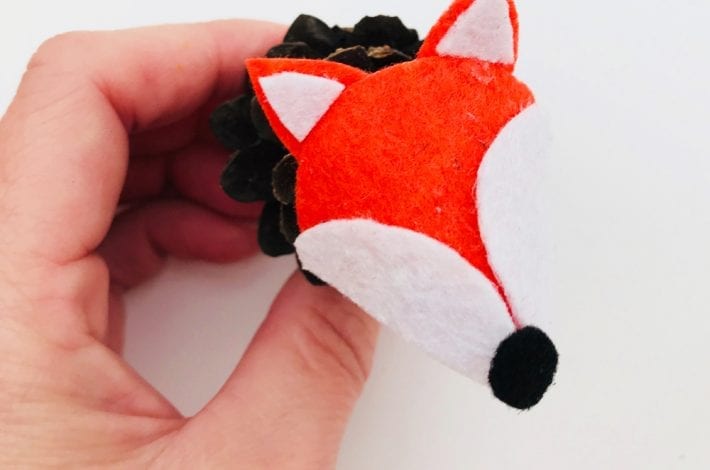 Make this pinecone fox as a great Autumn craft for kids. It's a quick and easy pine cone craft that kids will love this Autumn.