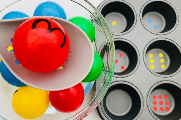 Make a fun number recognition game with these colourful balls. Fish out each number and match it to the right number of dots in the muffin tray.