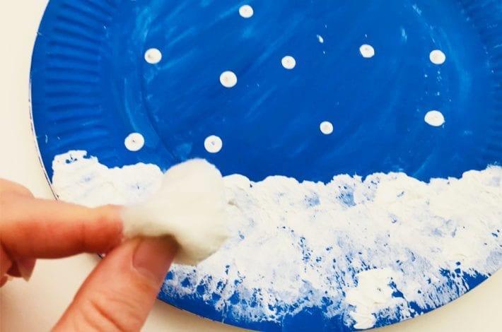 how to make clear paper plate snow globe crafts - a quick and easy Christmas craft to enjoy with kids that's just magical
