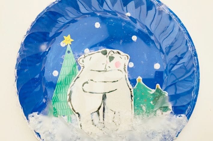 how to make clear paper plate snow globe crafts - a quick and easy Christmas craft to enjoy with kids that's just magical