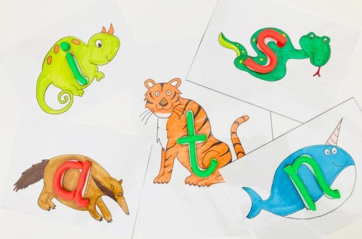 Make play dough letters using these free printable alphabet mats