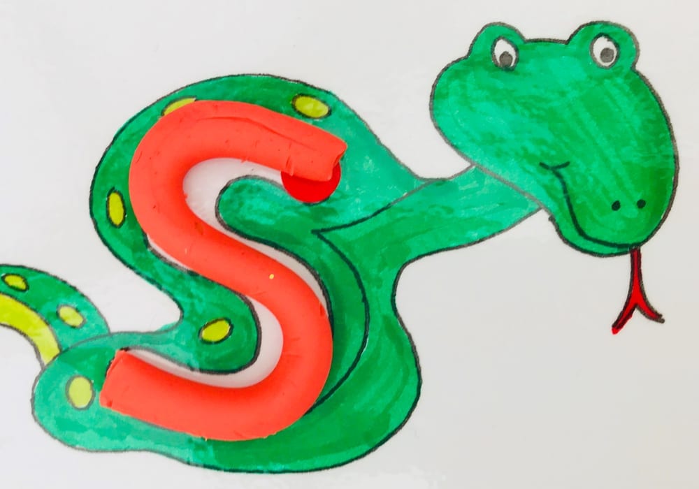 Make play dough letters using these free printable alphabet mats