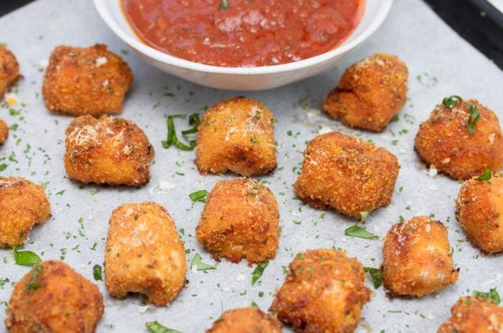 Chicken Parmesan bites - cheesy chicken pieces stuffed with mozzarella and cooked in marinara sauce - great for family dinners and kids meals