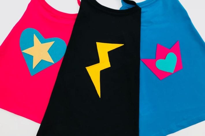 These no-sew superhero capes are genius. Make them as a fun kids craft at home for dressing up or school costumes. A great superhero t-shirt cape to make in minutes.