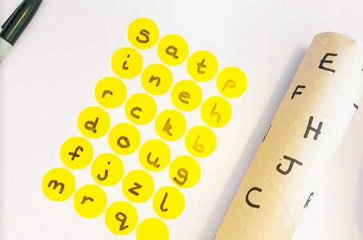 Letter matching activity - match lower case to upper case letters using cardboard rolls - easy learning activity for early years